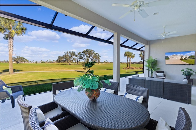 view of patio with outdoor lounge area and ceiling fan