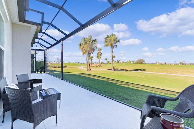 view of patio / terrace with a lanai