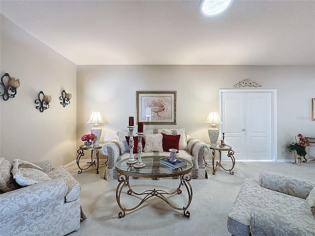 living room featuring light carpet