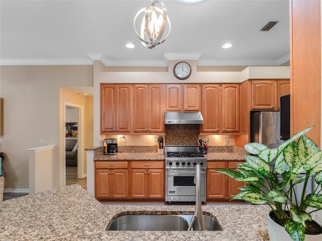 kitchen with light stone counters, visible vents, ornamental molding, stainless steel appliances, and under cabinet range hood