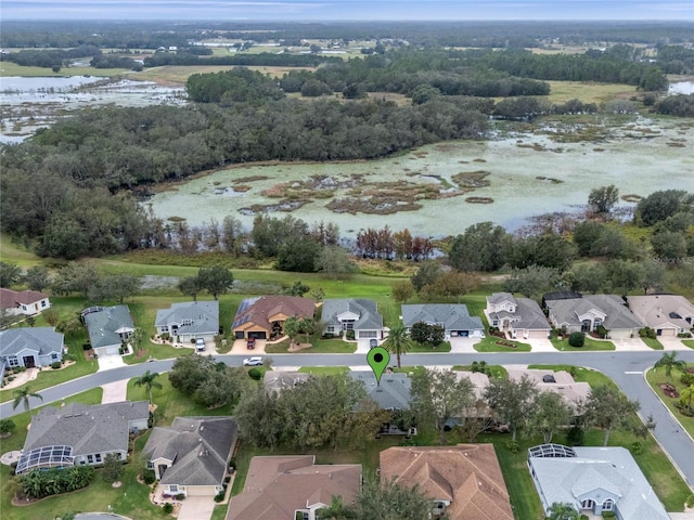 aerial view with a residential view and a water view