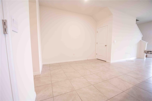 spare room featuring light tile patterned floors