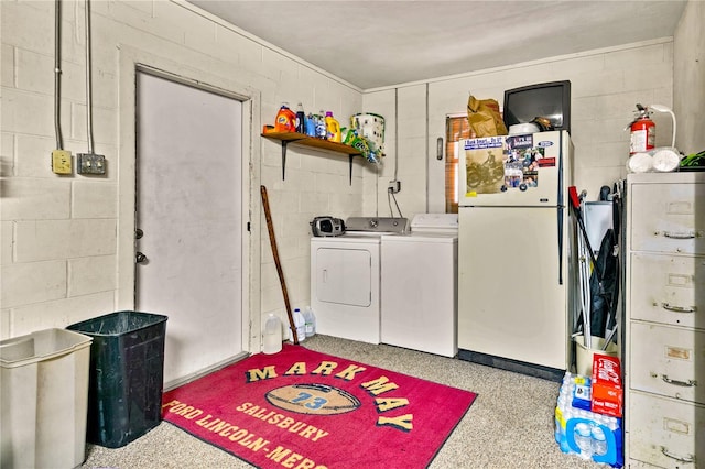 washroom with independent washer and dryer