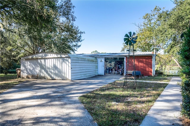 view of outbuilding featuring a garage