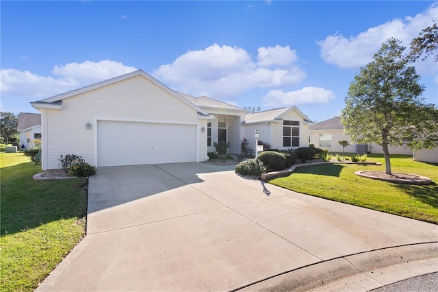 ranch-style home featuring a front yard and a garage