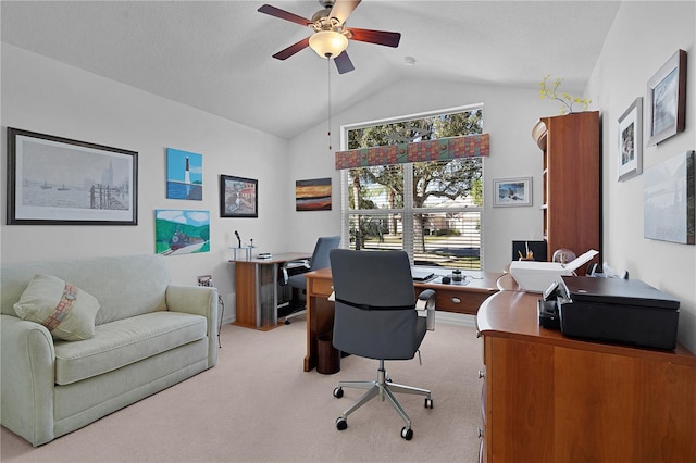 office area featuring ceiling fan, carpet floors, and vaulted ceiling