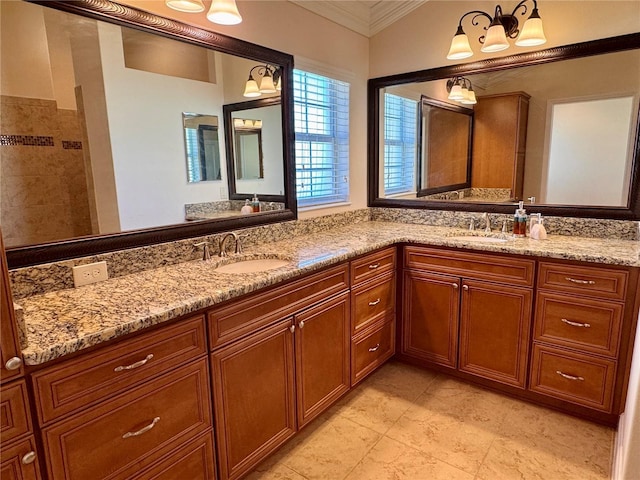 bathroom with vanity and ornamental molding