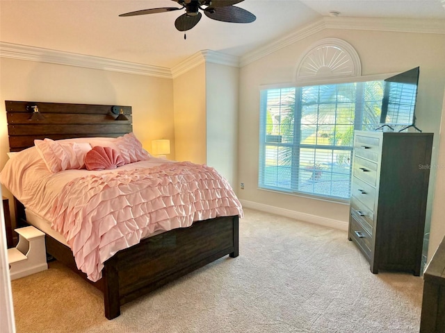 bedroom featuring ceiling fan, light colored carpet, ornamental molding, and vaulted ceiling