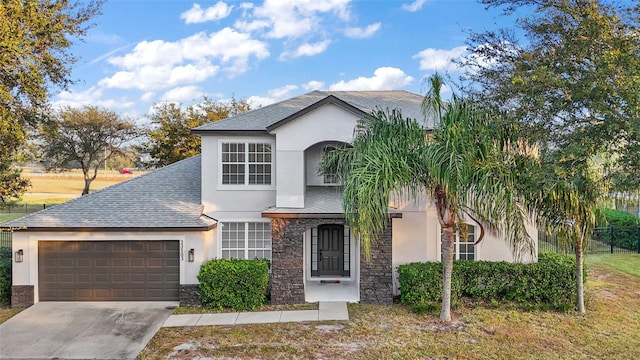 view of front of property featuring a garage