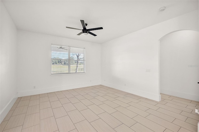 unfurnished room featuring ceiling fan