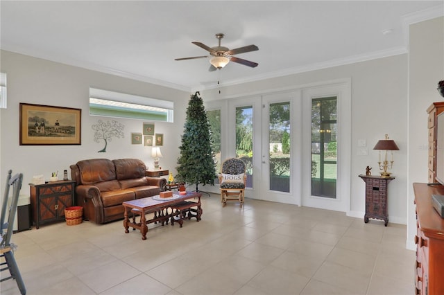 tiled living room featuring ceiling fan and crown molding