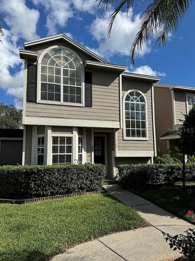 view of front of home featuring a front lawn