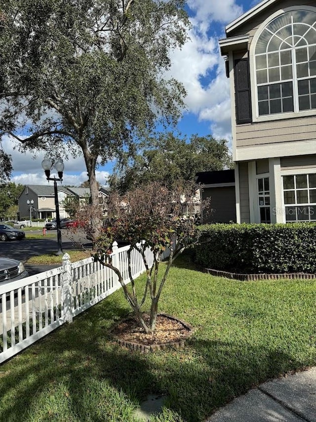 view of yard featuring fence