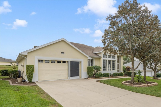 single story home featuring a front lawn and a garage