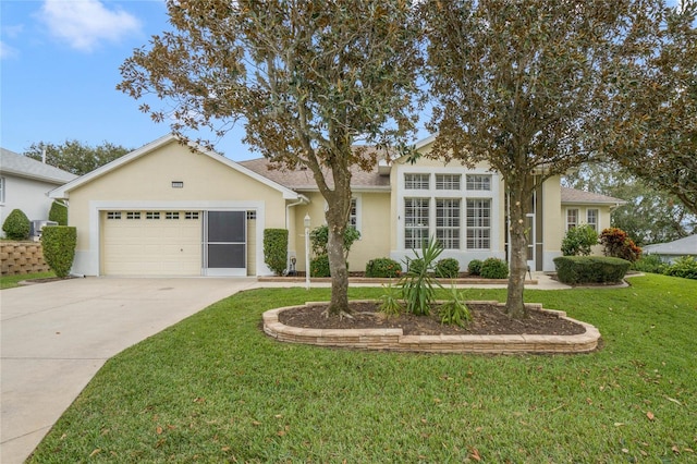 ranch-style home featuring a garage and a front lawn