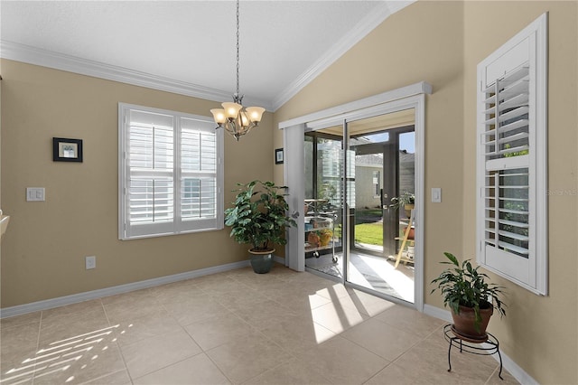 interior space featuring a wealth of natural light, light tile patterned floors, vaulted ceiling, and ornamental molding