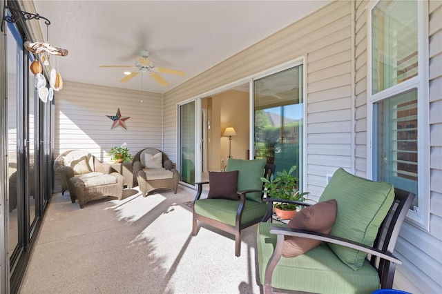 sunroom / solarium with ceiling fan