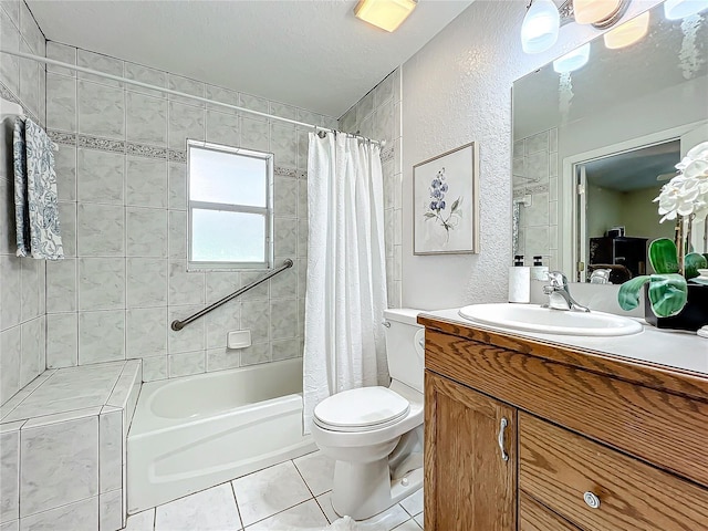 full bathroom with vanity, tile patterned flooring, toilet, a textured ceiling, and shower / tub combo with curtain