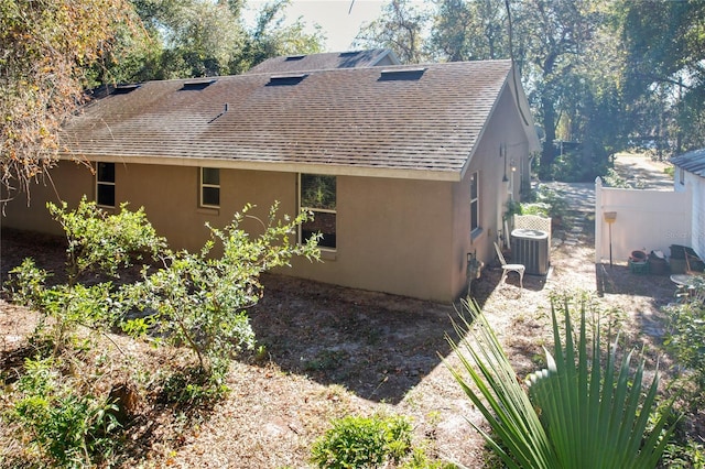 view of home's exterior featuring central AC unit