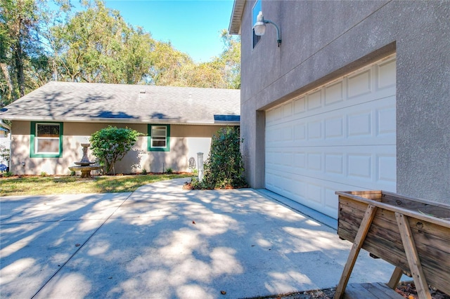 ranch-style house featuring a garage