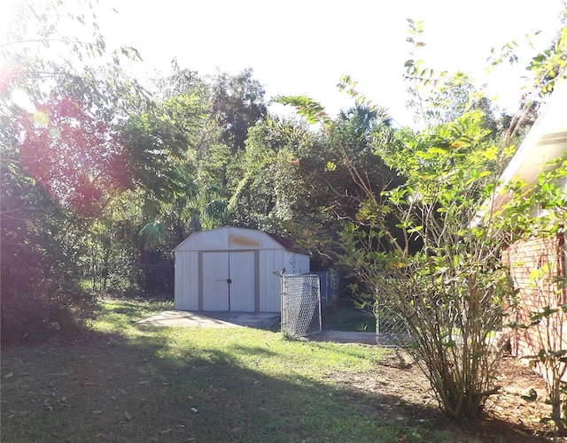 view of outdoor structure with a yard