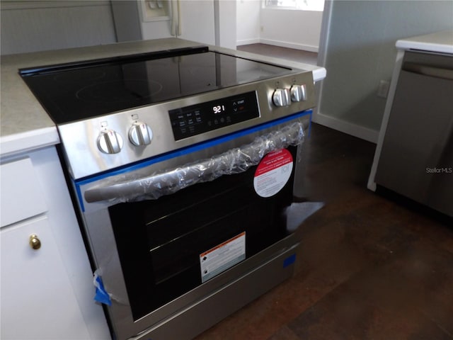 room details featuring stainless steel electric range