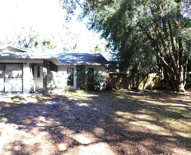 view of yard with a garage