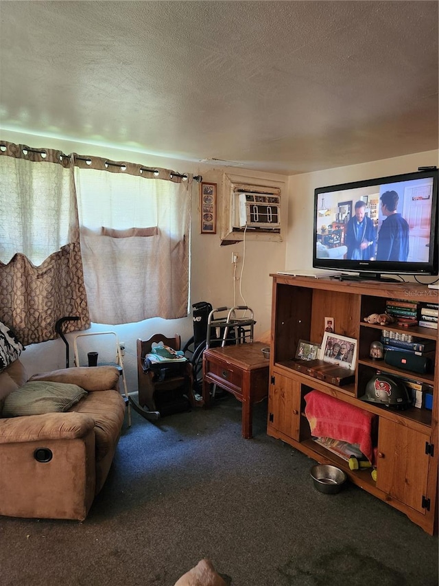 living room featuring a wall mounted AC, a textured ceiling, and dark colored carpet