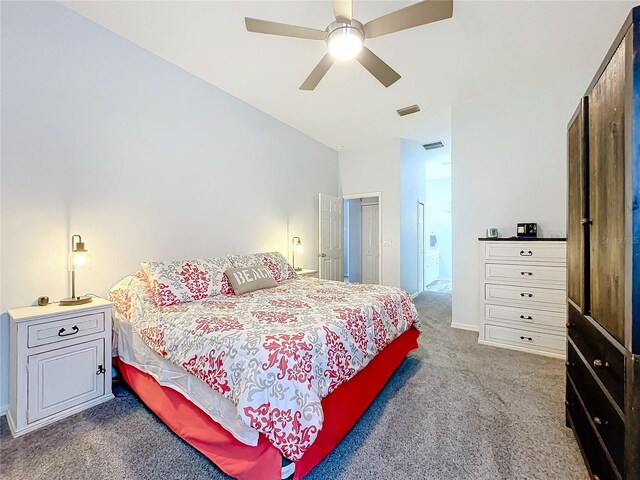 bedroom featuring ceiling fan and carpet