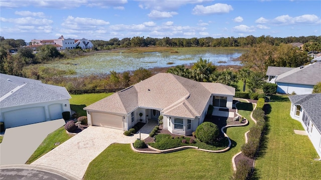 birds eye view of property featuring a water view