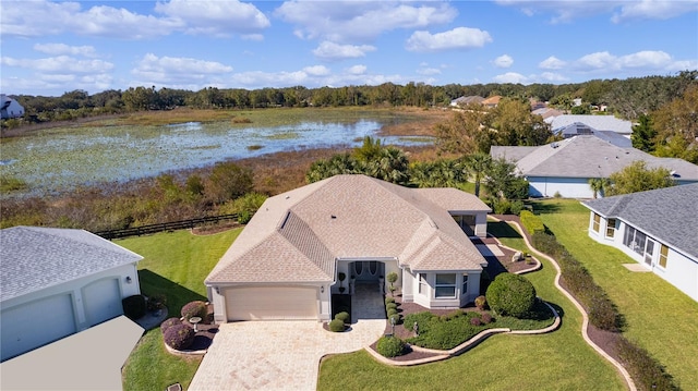 drone / aerial view with a water view