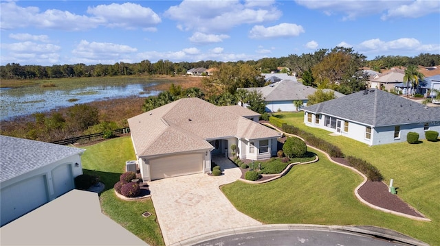 drone / aerial view featuring a water view