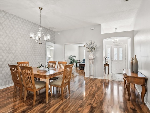 dining room featuring ceiling fan and dark wood-type flooring