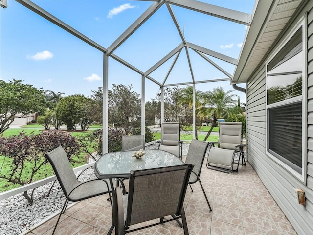 view of patio / terrace with a lanai