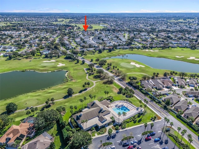 drone / aerial view with a water view