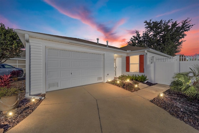 view of front of property with a garage