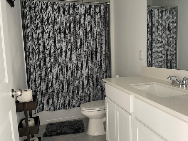 full bathroom with vanity, tile patterned floors, toilet, and shower / bath combo with shower curtain