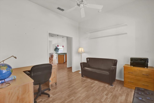 office area featuring ceiling fan and light wood-type flooring