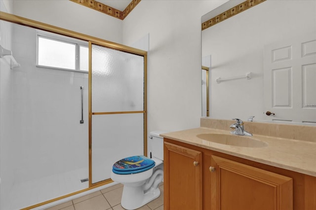 bathroom with toilet, tile patterned flooring, vanity, and walk in shower