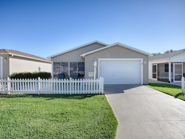 ranch-style home with a garage, a front lawn, and a sunroom