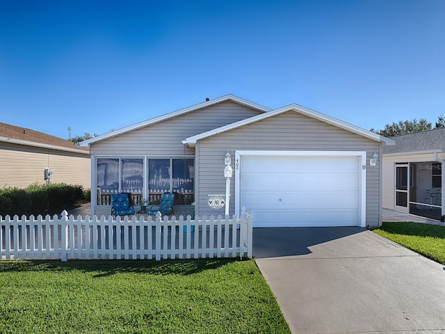 ranch-style home featuring a front yard and a garage