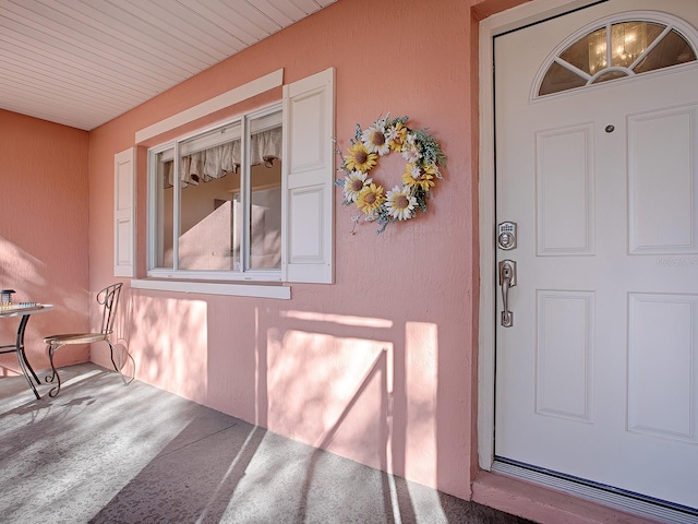 33236 Grand Cypress Way, Leesburg, FL 34748 - view of exterior entry with stucco siding