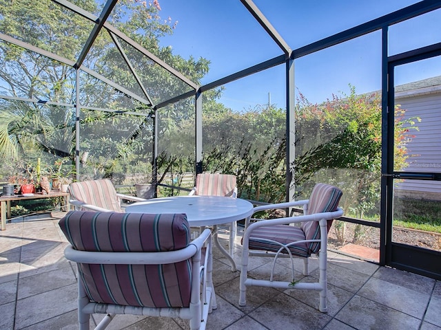 view of patio with a lanai