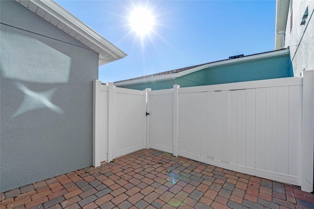 view of patio / terrace with a gate and fence