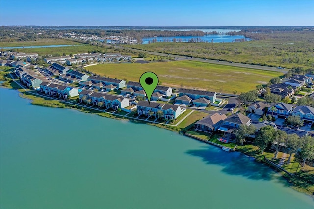 aerial view with a water view and a residential view