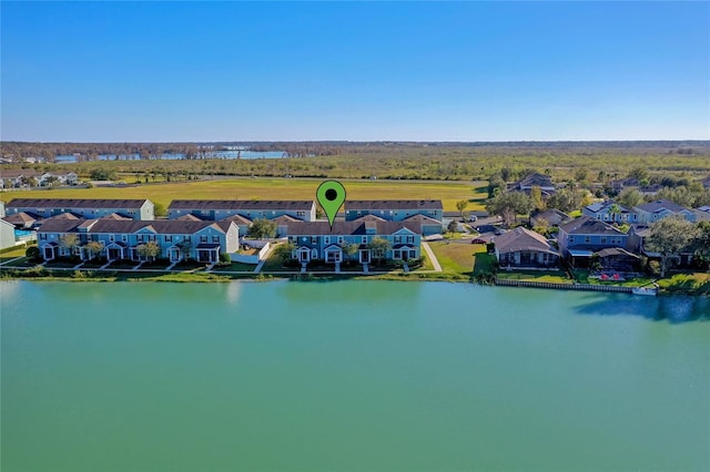 aerial view with a water view and a residential view