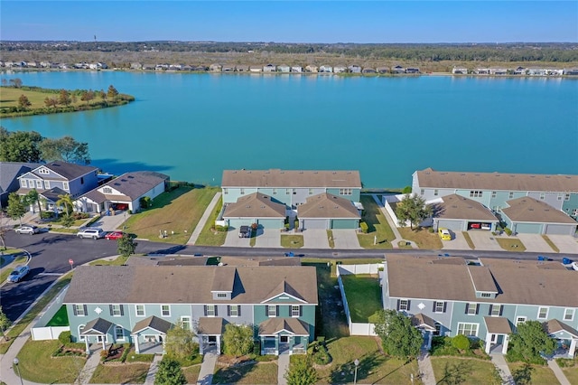 bird's eye view with a residential view and a water view