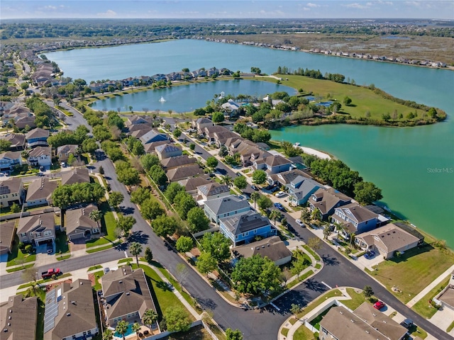 aerial view with a water view and a residential view