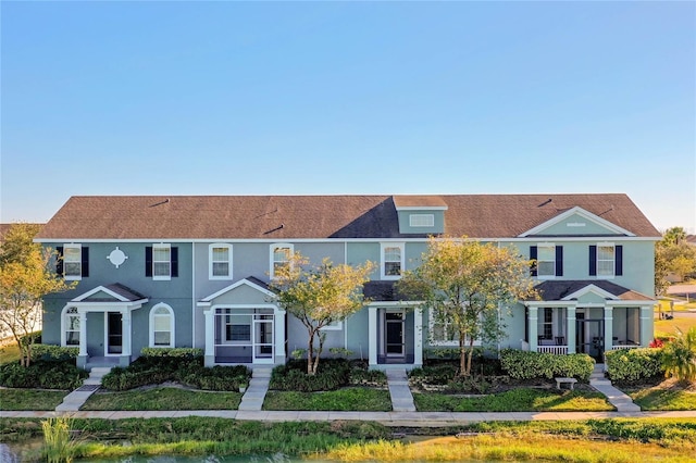 view of property with stucco siding