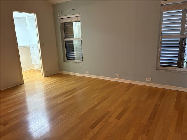 unfurnished room featuring light wood-type flooring